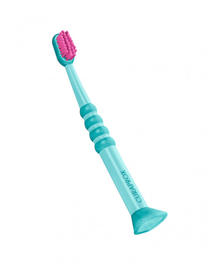 Escova de dentes Curaprox para bebé verde e rosa, vista 2